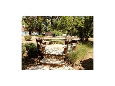 Detached deck in backyard