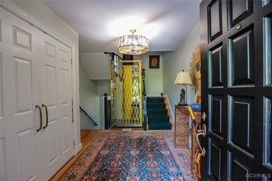 Foyer with hardwood / wood-style flooring and a no