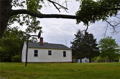 Very large backyard view.