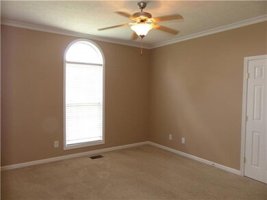 The second bedroom has ample closet space and access to a hall bath. 