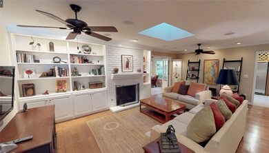 Family room with gas log fireplace.