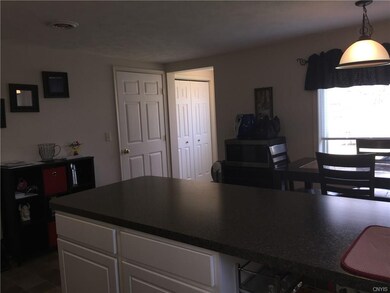 Room for table, chairs and stools at breakfast bar