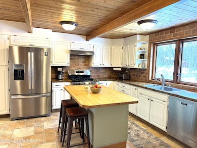 Kitchen w butcher block island