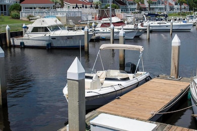 Dock featuring a water view