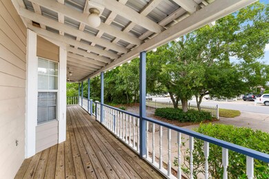 Side porch with a swing