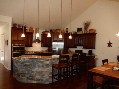 Kitchen. Generous storage space and eating area at
