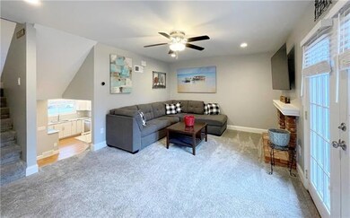 Living Room walks out to deck and backyard