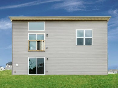 Rear of Home With Walkout Basement