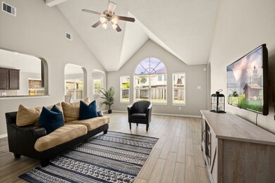 Open floor plan with great natural lighting and vaulted ceilings.