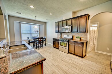 30715 Academy Trace Dr, Spring, TX 77386 - photo 7