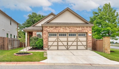 View of front of property with fence, concrete dr