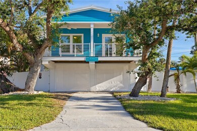View of front of house with a balcony