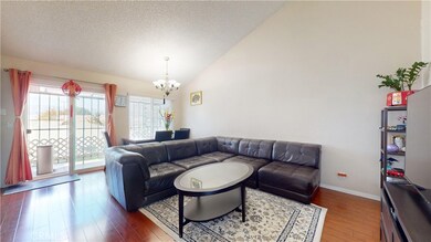 High ceiling living room. Pictures were taken before owners moved out.