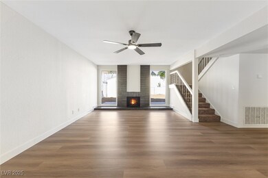Unfurnished living room featuring visible vents, a