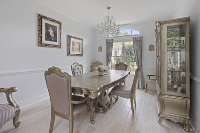 Dining room with light hardwood / wood-style floor