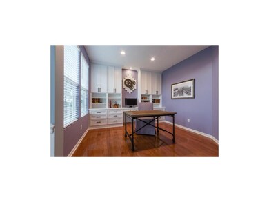 Main floor office with custom built-ins and wires 