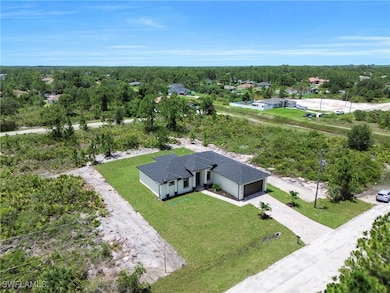 Aerial view of property and surrounding area