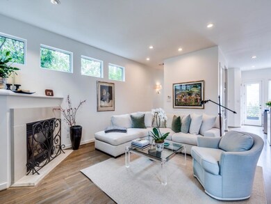 Cozy corner fireplace with transom windows above