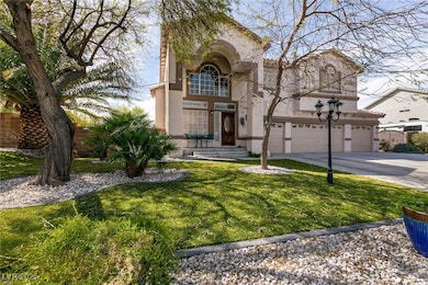 View of front facade with synthetic turf.