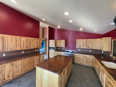 Chef's Kitchen featuring Wolf Range and Hickory Ca
