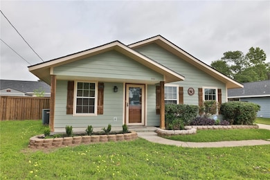 Bungalow featuring central air condition unit