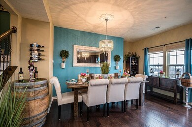 Beautiful dining room with updated lighting.