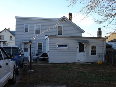 View of rear yard. Extension to house is part of t