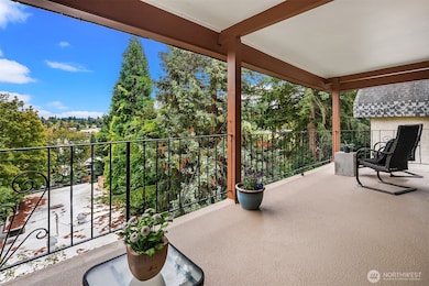 Spacious view of the deck. Enjoy your morning coffee while watching the sunrise over the Cascade Mountains.