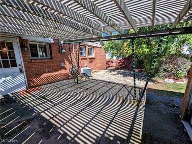 View of terrace featuring a pergola