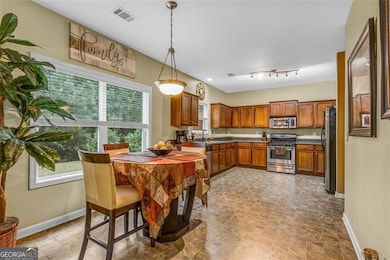 Very open concept leads from the family room to the breakfast area to the kitchen.