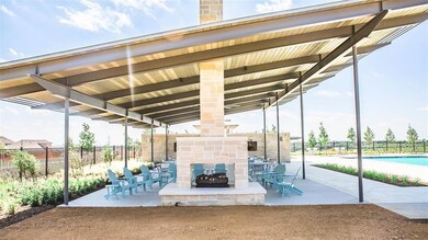 View of patio / terrace with a fenced in pool and 