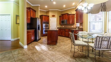 Gourmet Kitchen with Eat-In Nook and Wine Refriger