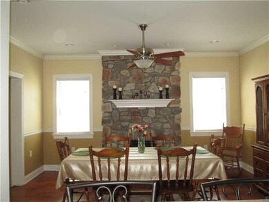 Dining Room. With hard wood flooring, crown moldin