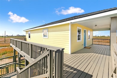 Large deck wraps around two side of the house and offers both shade and sun options throughout the day.