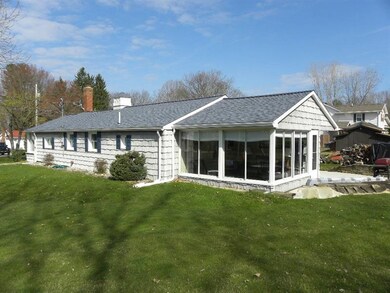 Back of Cottage with Glass Sunroom