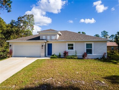 View of front of home featuring a garage, a front