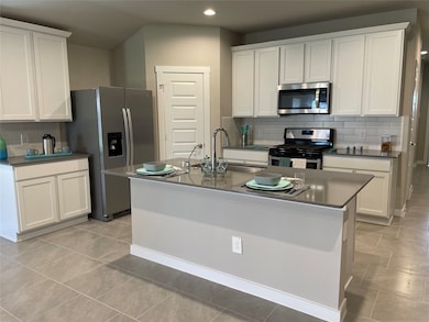 Lots of white cabinet space.