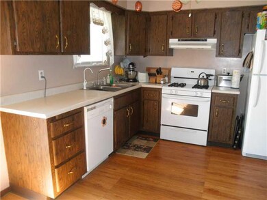 Kitchen. New laminate flooring for kitchen and adj