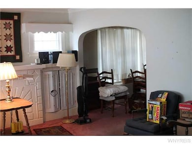 Living Room. Carpeted , but may have hardwood unde