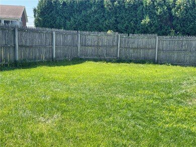 Partially fenced back yard