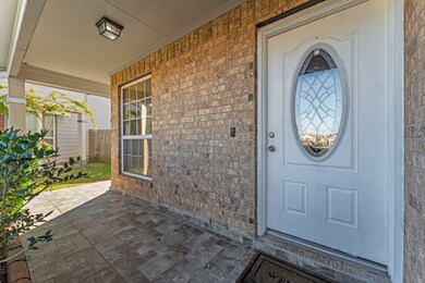 Welcoming front porch with a stylish brick design