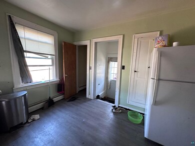 Interior space with baseboard heating, a wealth of