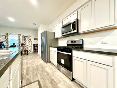 Clean modern kitchen with neutral colors, perfect for any style