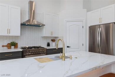 Kitchen featuring appliances with stainless steel