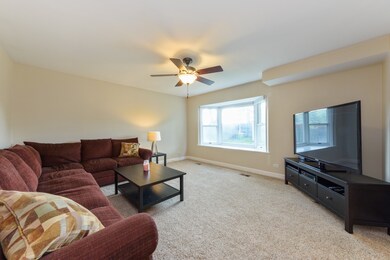 Just off the kitchen is this lovely family room.
