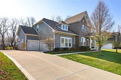 Large 3 car garage and extra parking next to the carriage bay.