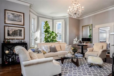 City Chic Living Room with Floor to Ceiling Window