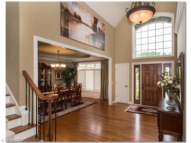 Hardwood two story entry with beautiful neutral co