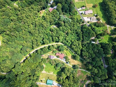 Birdseye view drone - lots to left of the road
