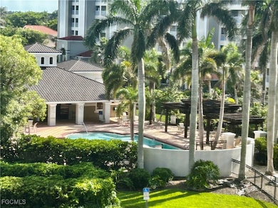 Community pool with a patio area